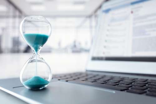 Fast Conveyancing 1 Image of hourgalss on a computer depicting fast conveyancing